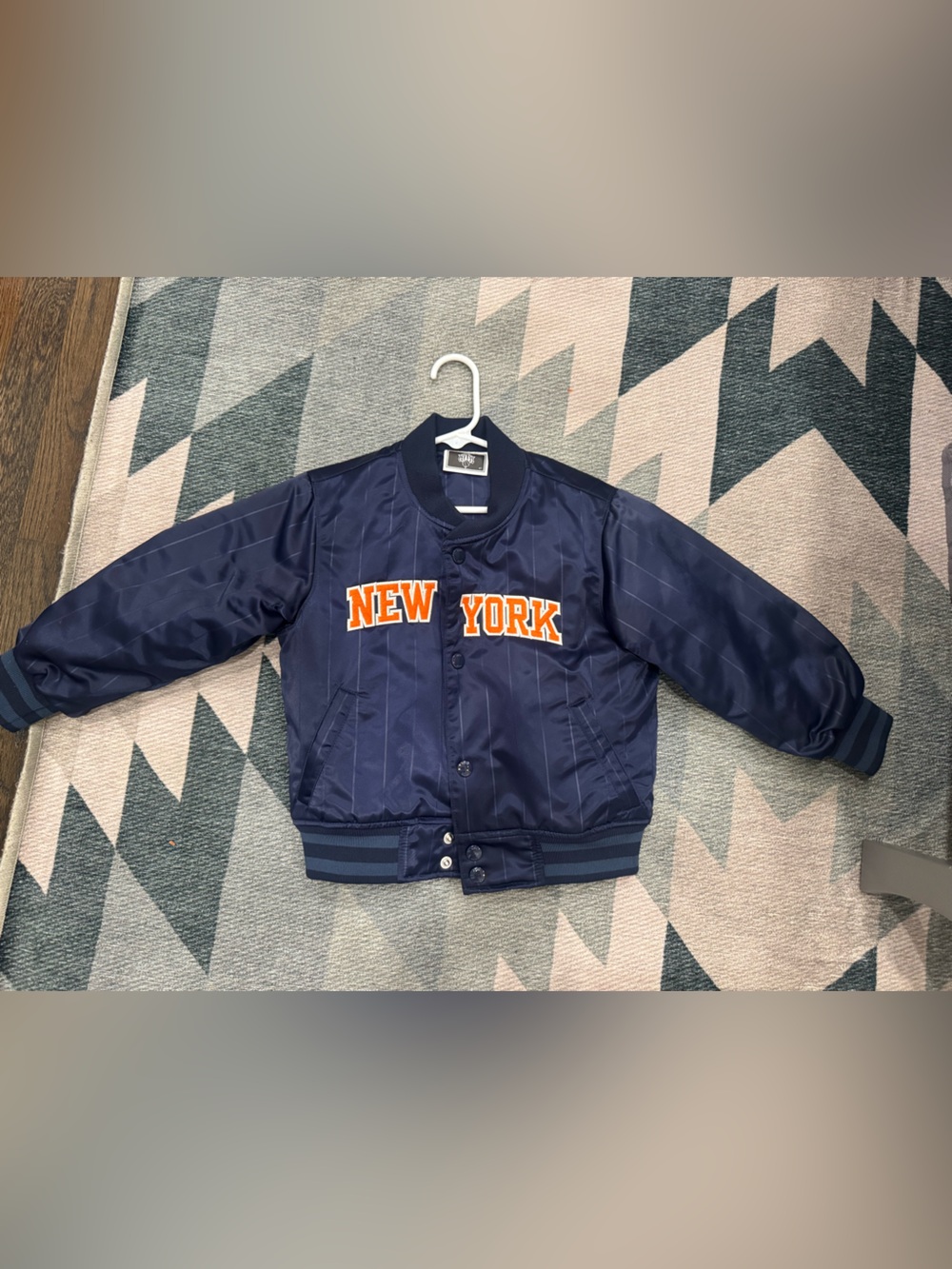 Kith Navy Jacket with Orange 'New York' Lettering
